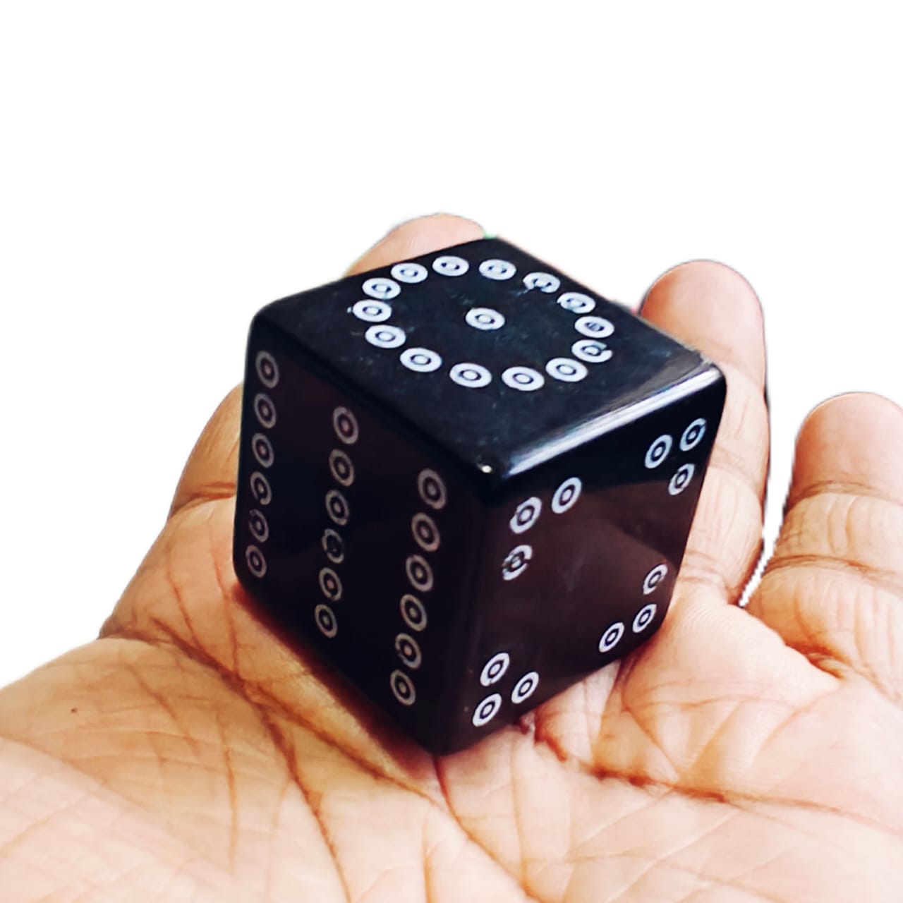 Avurudu Dice 18 Kate die held in a hand