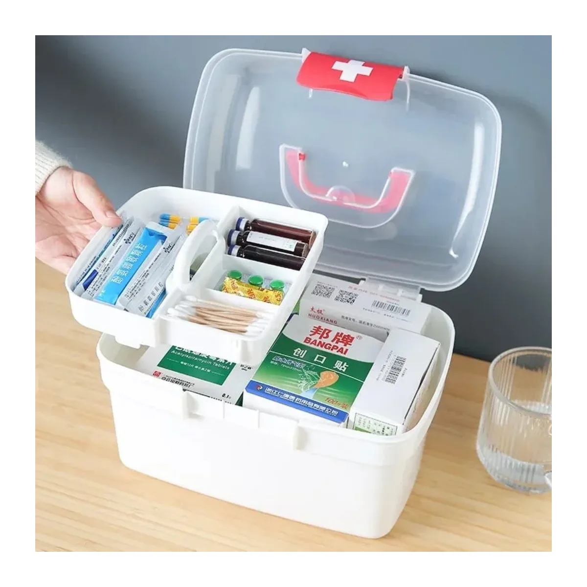 Medium white first – aid storage box with red handle and front closure